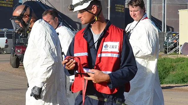 Representative image: The Emergency Response Team (ERT) is evaluated during an exercise drill featuring a container of acid that has leaked. The ERT contain the spill and don appropriate personal protective equipment as part of their training