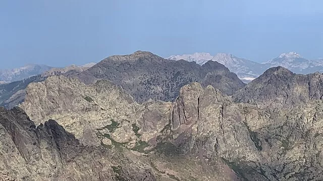 Representative image: Hiking trail GR20, Monte Cinto, a view to Calvi coast and "a Muvrella" mountain chain.