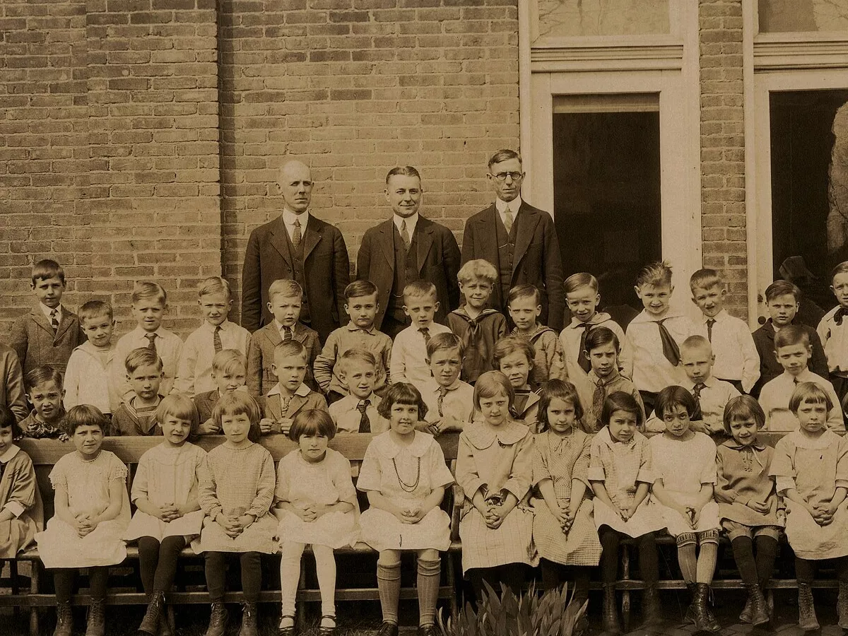 Representative image: Class photo (Hollister 09-11237), National Museum of Health and Medicine Description: A class of first grade students sits with Dr. C.J. Hollister acknowledging the accomplishment of all students having perfect condition